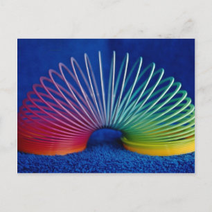 Rainbow-coloured slinky toy postcard