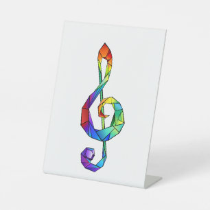 Rainbow musical key treble clef pedestal sign