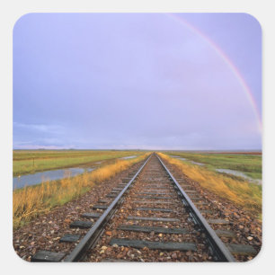 Rainbow over railroad tracks near Fairfield Square Sticker