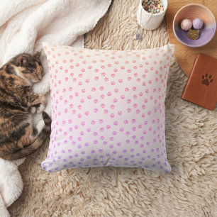 Rainbow pawprints cushion