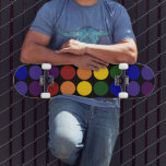 Rainbow Polka Dots on Black Skateboard<br><div class="desc">Rows of rainbow coloured polka dots cover a black background. The offset rows form diagonals of each colour: violet,  indigo,  blue,  green,  yellow,  orange,  and red.  

 Digitally created image. 
 Copyright © Claire E. Skinner. All rights reserved.</div>