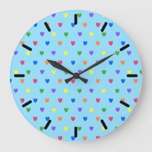 Rainbow polka hearts on baby blue large clock