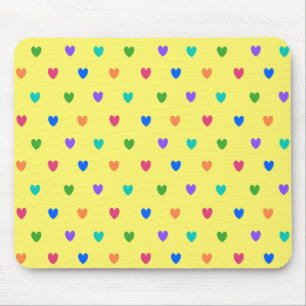 Rainbow polka hearts on yellow mouse mat