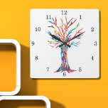 Rainbow Tree Square Wall Clock<br><div class="desc">This whimsical clock is decorated with a print of a Tree Of Life design in rainbow colours. The tree was originally made in mosaic using tiny fragments of brightly coloured glass. Because we create our own artwork you won't find this exact image from other designers. Original Mosaic © Michele Davies....</div>