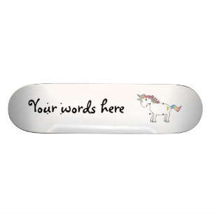 Rainbow unicorn with gold hearts skateboard