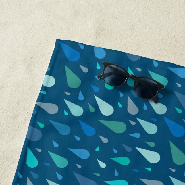Rainy day pattern with blue raindrops beach towel (In Situ)