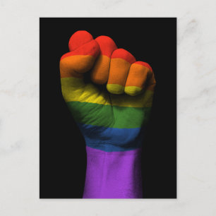 Raised Clenched Fist with Gay Pride Rainbow Flag Postcard