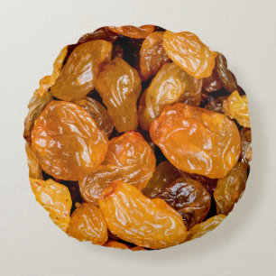 Raisins close up photo texture background. round cushion