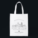 Raleigh, North Carolina Wedding | Stylised Skyline Reusable Grocery Bag<br><div class="desc">A unique wedding bag for a wedding taking place in the beautiful city of Raleigh,  North Carolina.  This bag features a stylised illustration of the city's unique skyline with its name underneath.  This is followed by your wedding day information in a matching open lined style.</div>