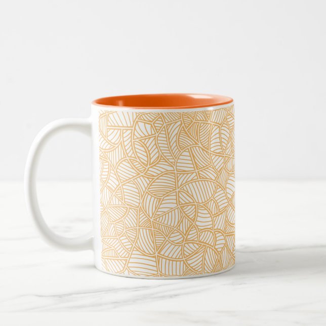 Random Leaf Mosaic Pale Orange Two-Tone Coffee Mug (Left)