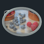 Raspberries and Blueberries Oval Belt Buckle<br><div class="desc">"Fresh raspberries and blueberries.
Image © Angelika Stern"</div>