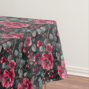Raspberry, burgundy flowers on dark gray tablecloth