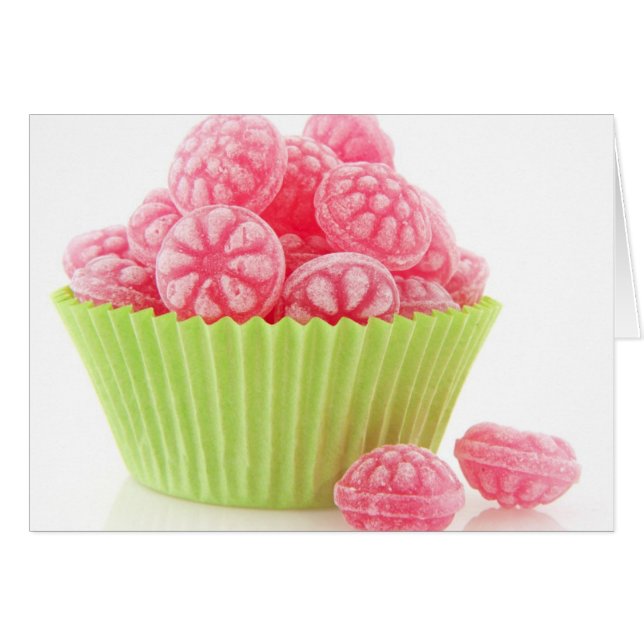 Raspberry tasty candy sweets in green cup cake (Front Horizontal)