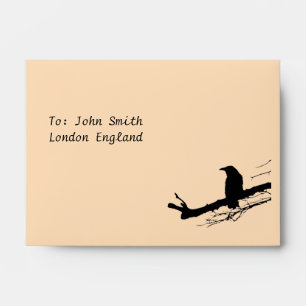 Raven, rook or crow bird on a branch envelope