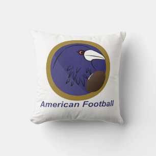 Raven with american football ball cushion