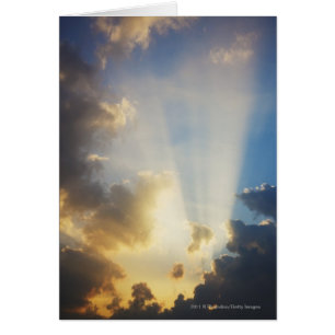 Rays Of Light Shining Through The Clouds