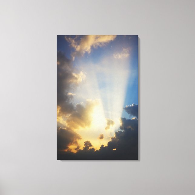 Rays Of Light Shining Through The Clouds Canvas Print (Front)