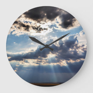 Rays of sunshine from above large clock