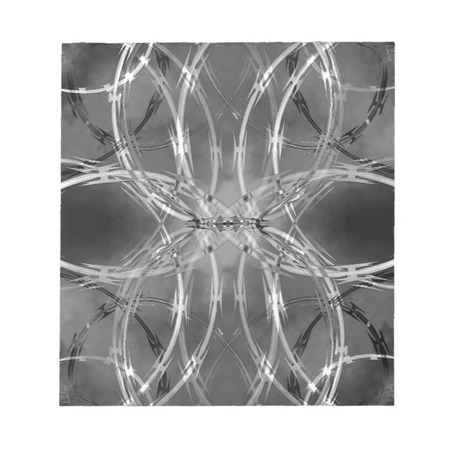 Razor wire against dark clouds notepad (Front)