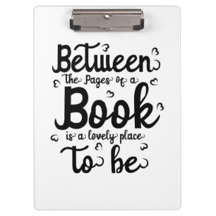 Reading Art Between The Paper Of A Book Clipboard