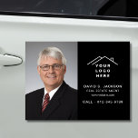 Real Estate Agent Black Logo Photo Car Magnet<br><div class="desc">Create a polished, professional look with this Real Estate Agent Black Logo Photo Car Magnet. This customisable magnet prominently displays your logo, contact information, and a photo, ensuring high visibility while you’re on the go. Ideal for realtors, it’s a sleek and convenient way to advertise your services, promote your brand,...</div>