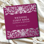 Real Foil Vintage Floral Purple Wedding Guest Book<br><div class="desc">Real Foil Vintage Floral Purple Wedding Guest Book features a vintage flower frame border in silver foil script with your names,  location and wedding date on a purple background. Add your custom text on the spine of the guest book. Created by Evco Studio www.zazzle.com/store/evcostudio</div>