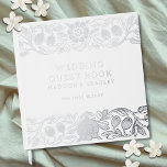 Real Foil Vintage Floral White Wedding Guest Book<br><div class="desc">Real Foil Vintage Floral White Wedding Guest Book features a vintage flower frame border in silver foil script with your names,  location and wedding date on a white background. Add your custom text on the spine of the guest book. Created by Evco Studio www.zazzle.com/store/evcostudio</div>
