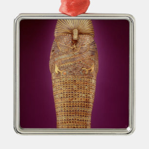 Rear view of one of the canopic coffins metal tree decoration