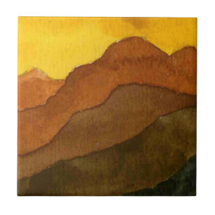 Receding mountain ranges with yellow sunrise sky tile