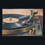 Record Player in Action Tea Towel<br><div class="desc">The title "Record Player in Action" accurately describes the image and evokes a sense of nostalgia and analogue warmth. It conjures up the image of a record spinning on a turntable,  bringing music to life in a physical way.</div>