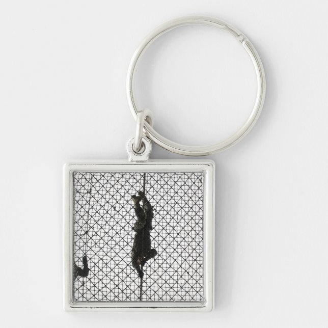 recruits completing an obstacle key ring (Front)