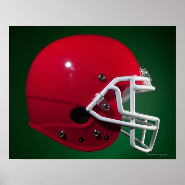 Red American football helmet on green background Poster (Front)