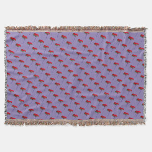 Red and blue poppy flower on purple throw blanket
