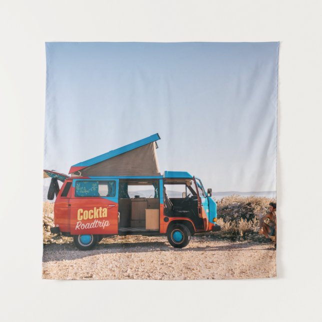Red and blue vehicle beside man tapestry (Front)