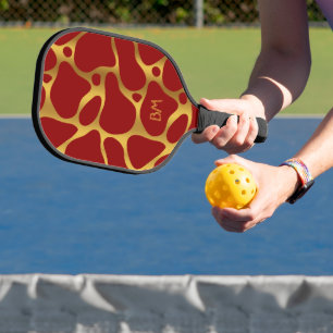 Red and gold abstract giraffe pattern pickleball paddle