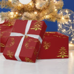 Red and Gold Christmas Wrapping Paper<br><div class="desc">Wrap your holiday gifts in timeless elegance with this luxurious Red & Gold Christmas Wrapping Paper. Featuring ornate golden holly, shimmering Christmas trees, twinkling stars and delicate festive accents, each detail glows against a rich ruby-red background. Perfect for presents big and small, this premium paper adds a touch of classic...</div>