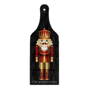 Red and Gold Nutcracker on Black  Cutting Board