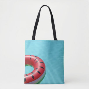 Red and green lifebuoy on swimming pool tote bag