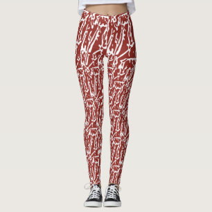 Red and orange abstract shapes blend and overlap a leggings