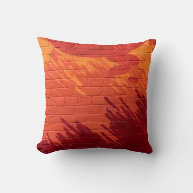 Red and orange painted brick wall cushion (Front)