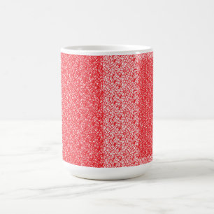 Red and orange wrapping paper with a geometric mot coffee mug