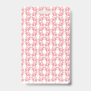 Red and pink wrapping paper featuring a repeating ID badge