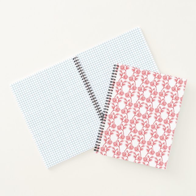 Red and pink wrapping paper featuring a repeating  notebook (Inside)