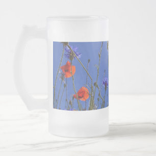 red and purple roses embracing a blue sky and sun frosted glass beer mug
