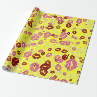Red and rose kisses in yellow wrapping paper