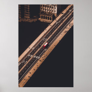 RED AND WHITE BUS RUNNING ON BRIDGE POSTER