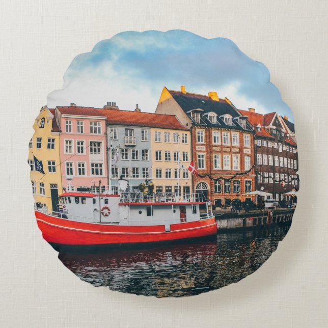 RED AND WHITE CONCRETE BUILDING ROUND CUSHION (Front)
