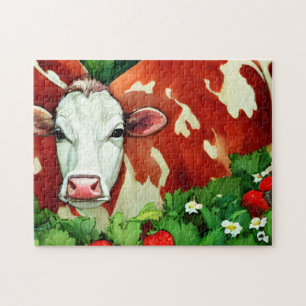 Red and White Dairy Cow in a Strawberry Patch  Jigsaw Puzzle