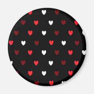 Red and white hearts on black magnet