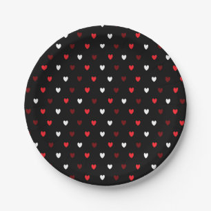 Red and white hearts on black paper plate